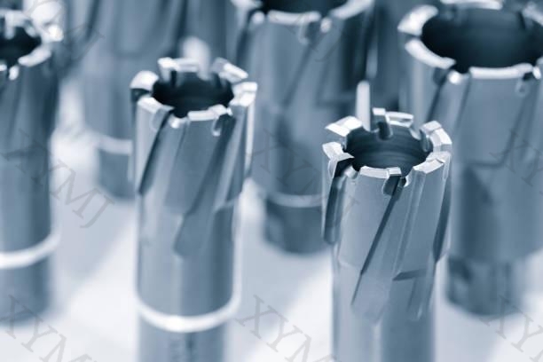 Drills with interchangeable tungsten carbide heads